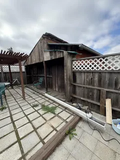 a front view of a house with a patio