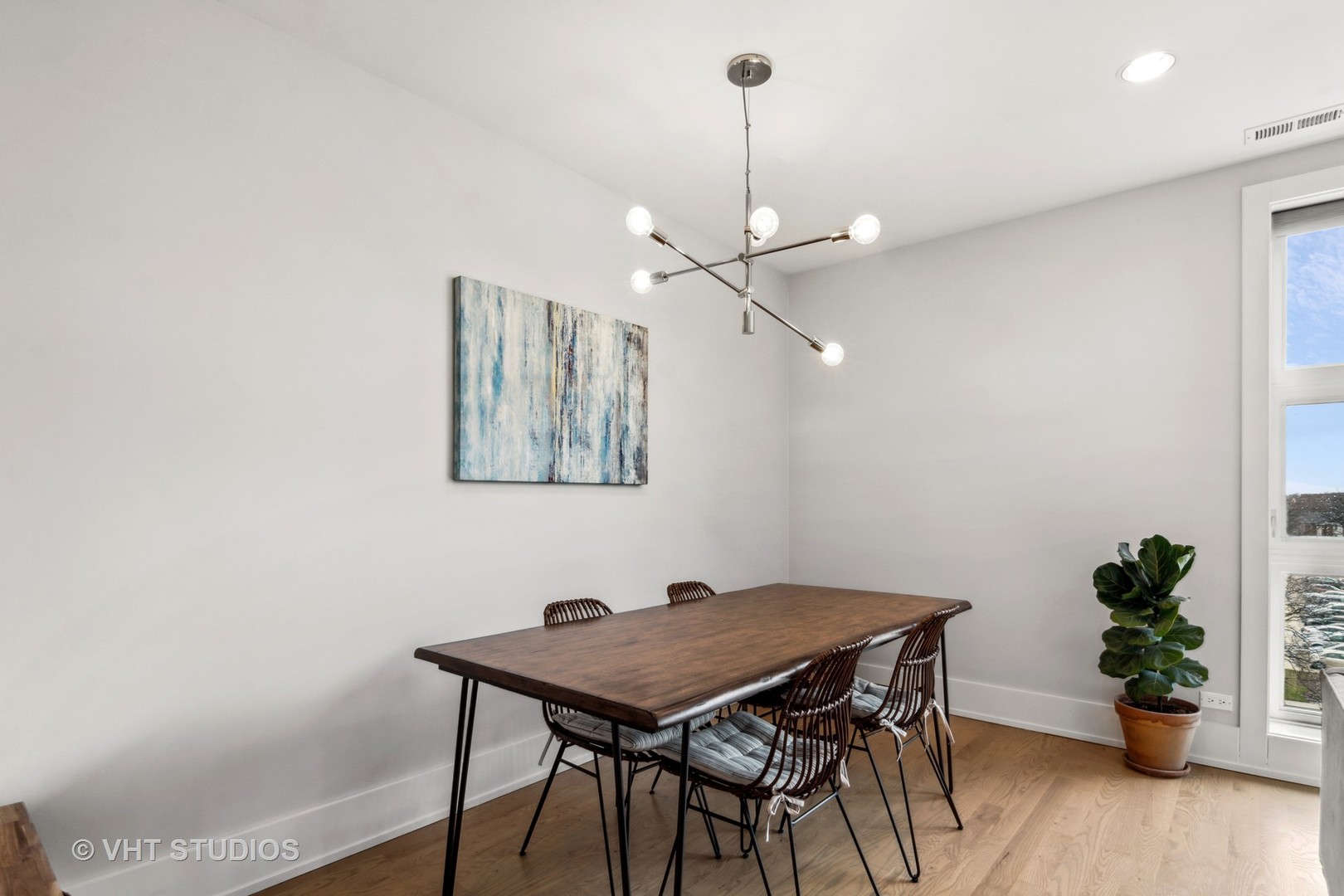1209 East 46th Street, Unit 4E Chicago, IL 60653 - Photo 4 of 15 a view of a workspace with furniture and wooden floor