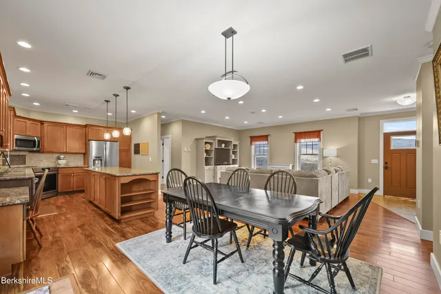 a view of a dining room with furniture