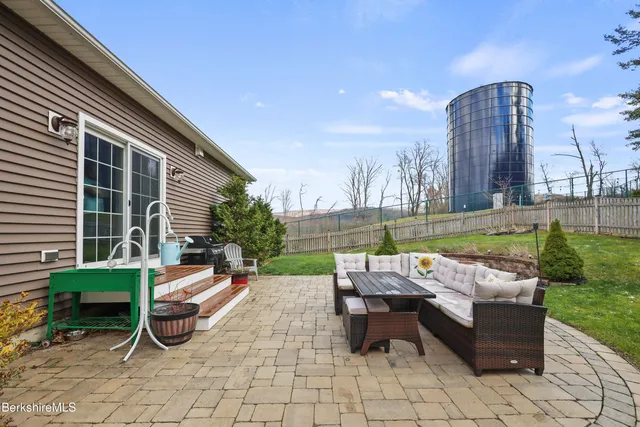 a view of balcony with furniture