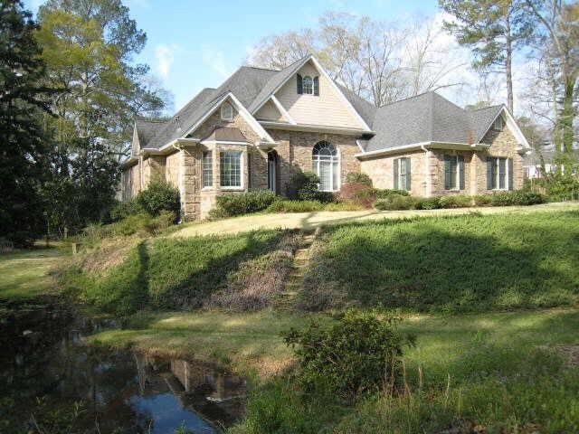 100 Mimosa Drive Rome, GA 30161 - Photo 1 of 1 a front view of a house with a yard