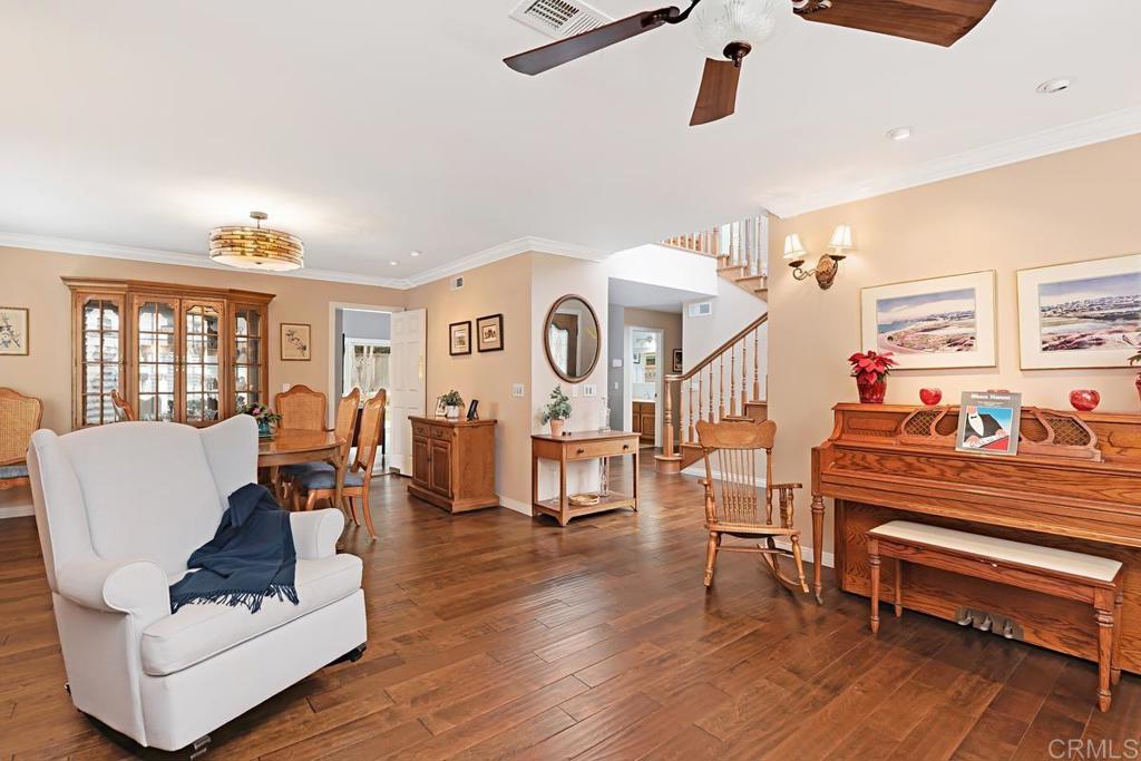1369 Cherrytree Court Encinitas, CA 92024 - Photo 18 of 41 a living room with furniture and wooden floor