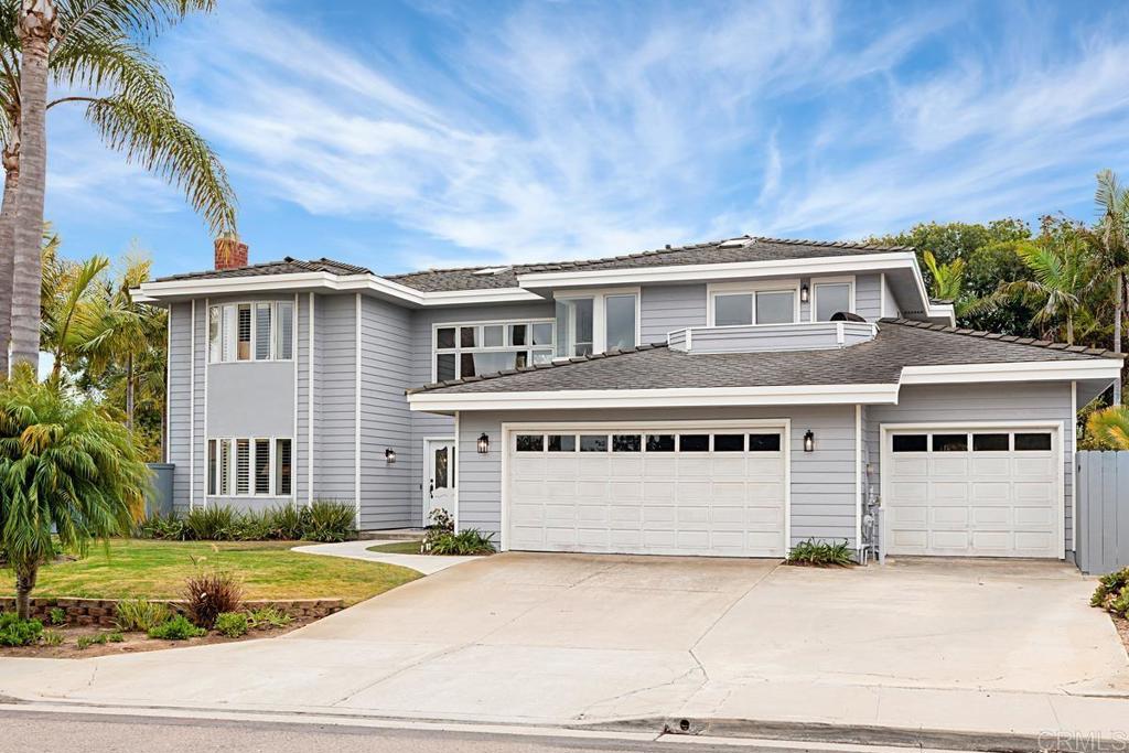 1369 Cherrytree Court Encinitas, CA 92024 - Photo 2 of 41 a front view of a house with a garden