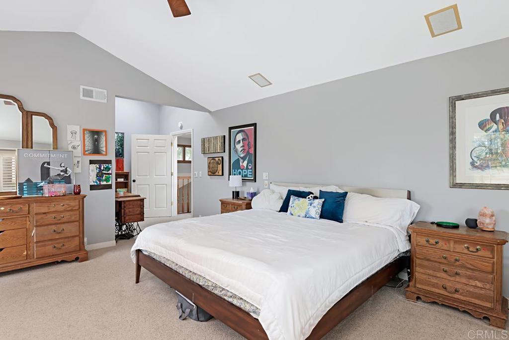 1369 Cherrytree Court Encinitas, CA 92024 - Photo 21 of 41 a bedroom with a bed and a dresser