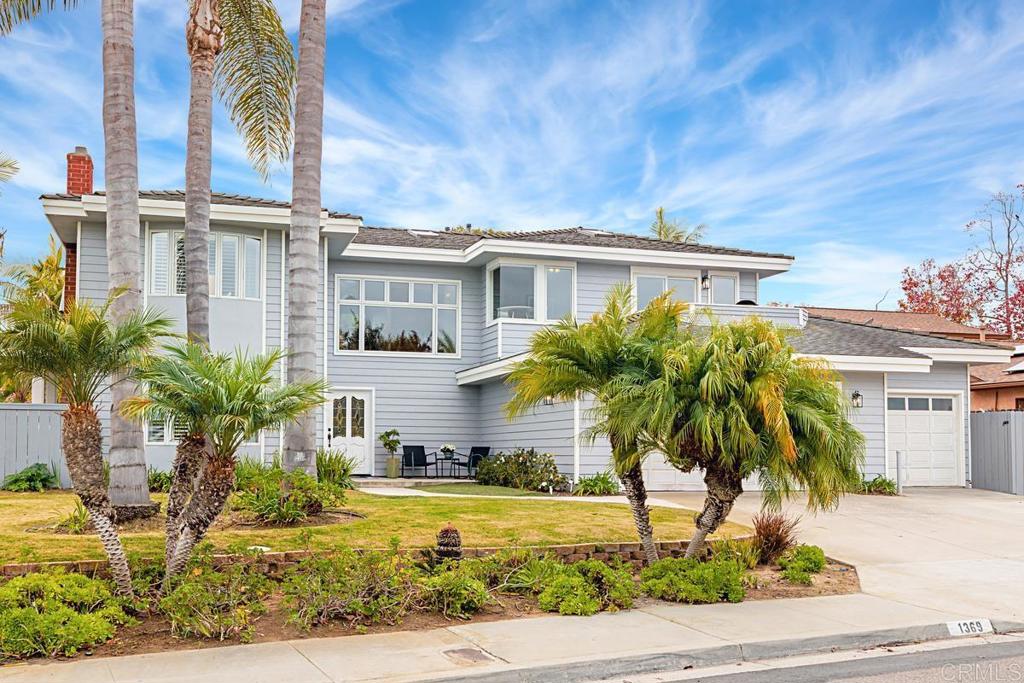 1369 Cherrytree Court Encinitas, CA 92024 - Photo 3 of 41 a front view of a house with a yard