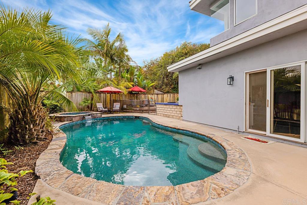 1369 Cherrytree Court Encinitas, CA 92024 - Photo 38 of 41 a view of a swimming pool with back yard of a house