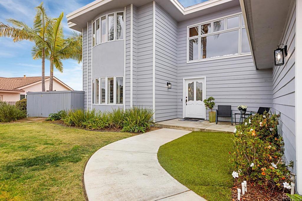 1369 Cherrytree Court Encinitas, CA 92024 - Photo 4 of 41 a view of a backyard with plants and a patio