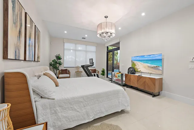 a bathroom with a bathtub sink and mirror