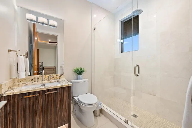 a utility room with sink dryer and washer
