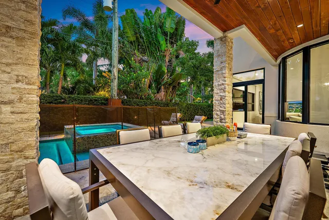 a view of a room with wooden floor and iron fence