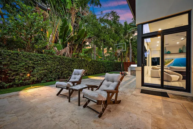 a view of a backyard with street