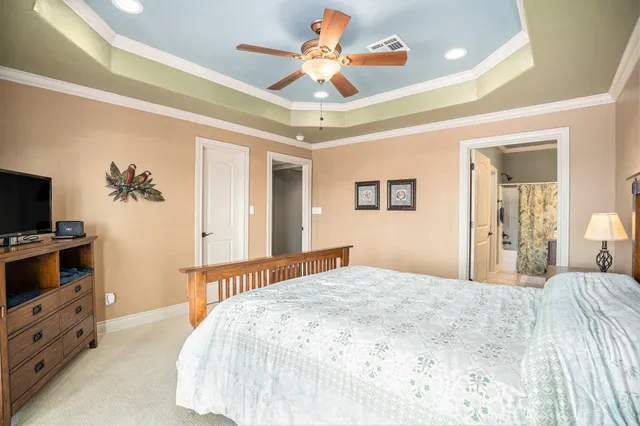 a view of backyard with a deck and wooden floor