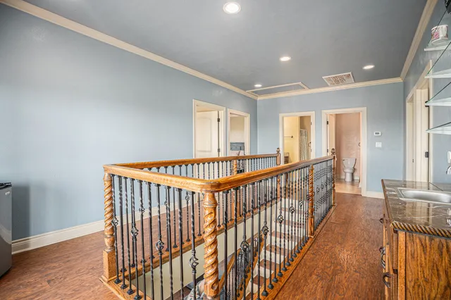 an aerial view of a house with a big yard