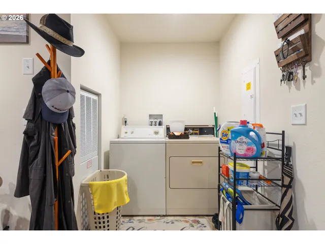 a bedroom with a bed and a television