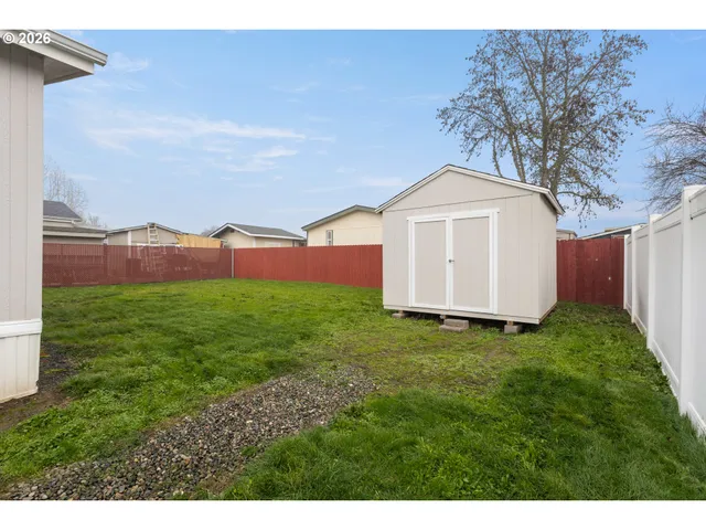 a view of a backyard with a garden