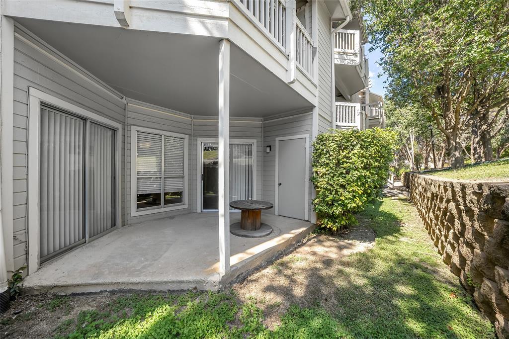 2450 Wickersham Lane, Unit M1301 Austin, TX 78741 - Photo 11 of 11 a view of a pathway of house