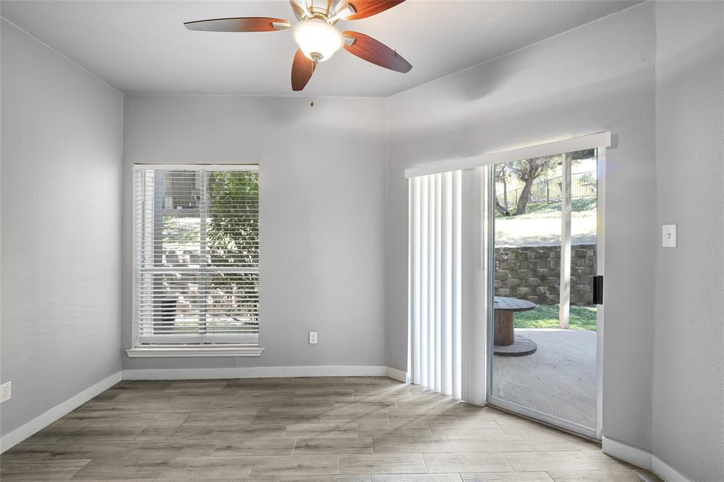 2450 Wickersham Lane, Unit M1301 Austin, TX 78741 - Photo 9 of 11 a view of an empty room with a window