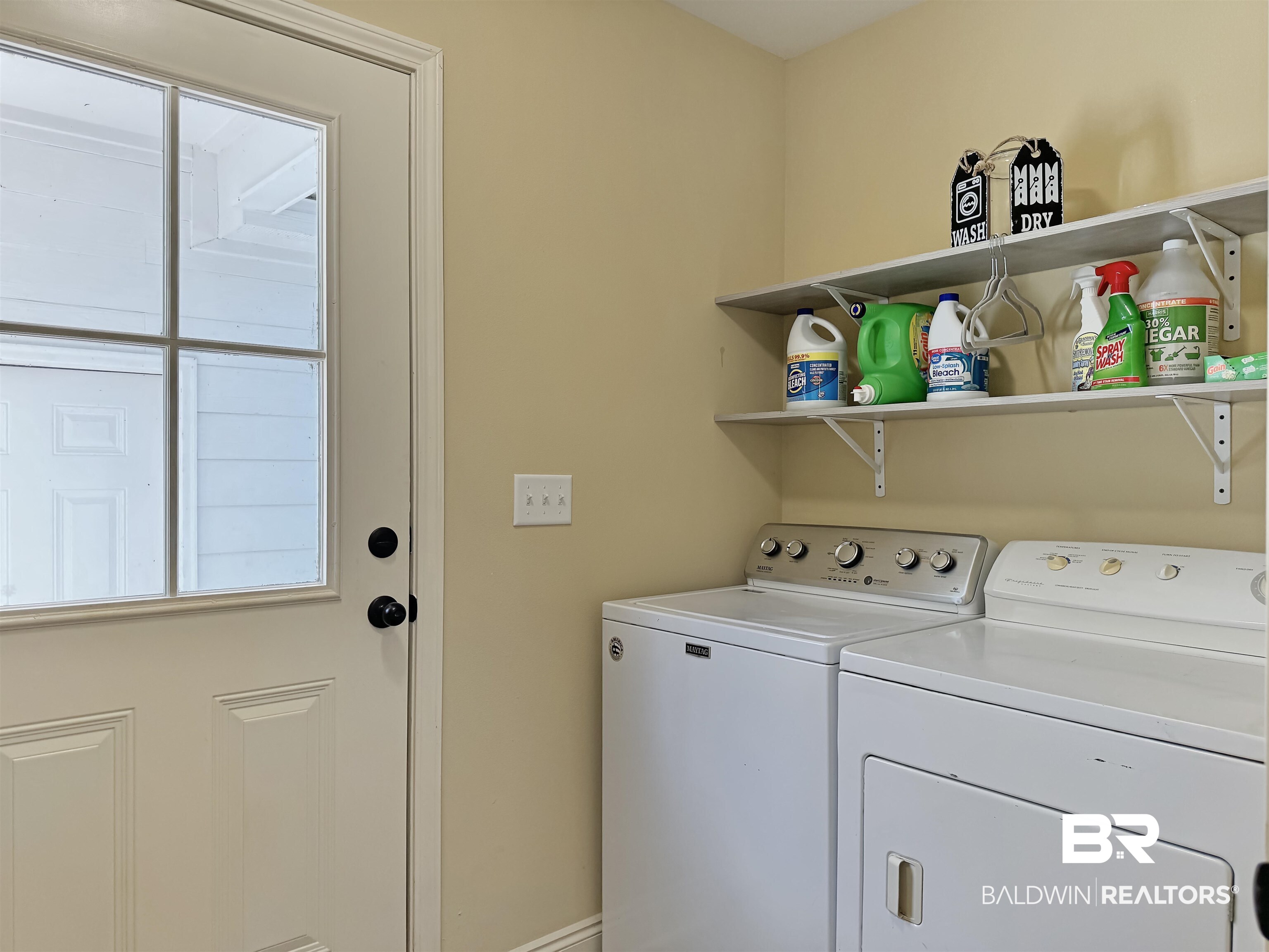 30687 Brady Road Robertsdale, AL 36567 - Photo 33 of 53 This room is spacious and leads out to the garage.