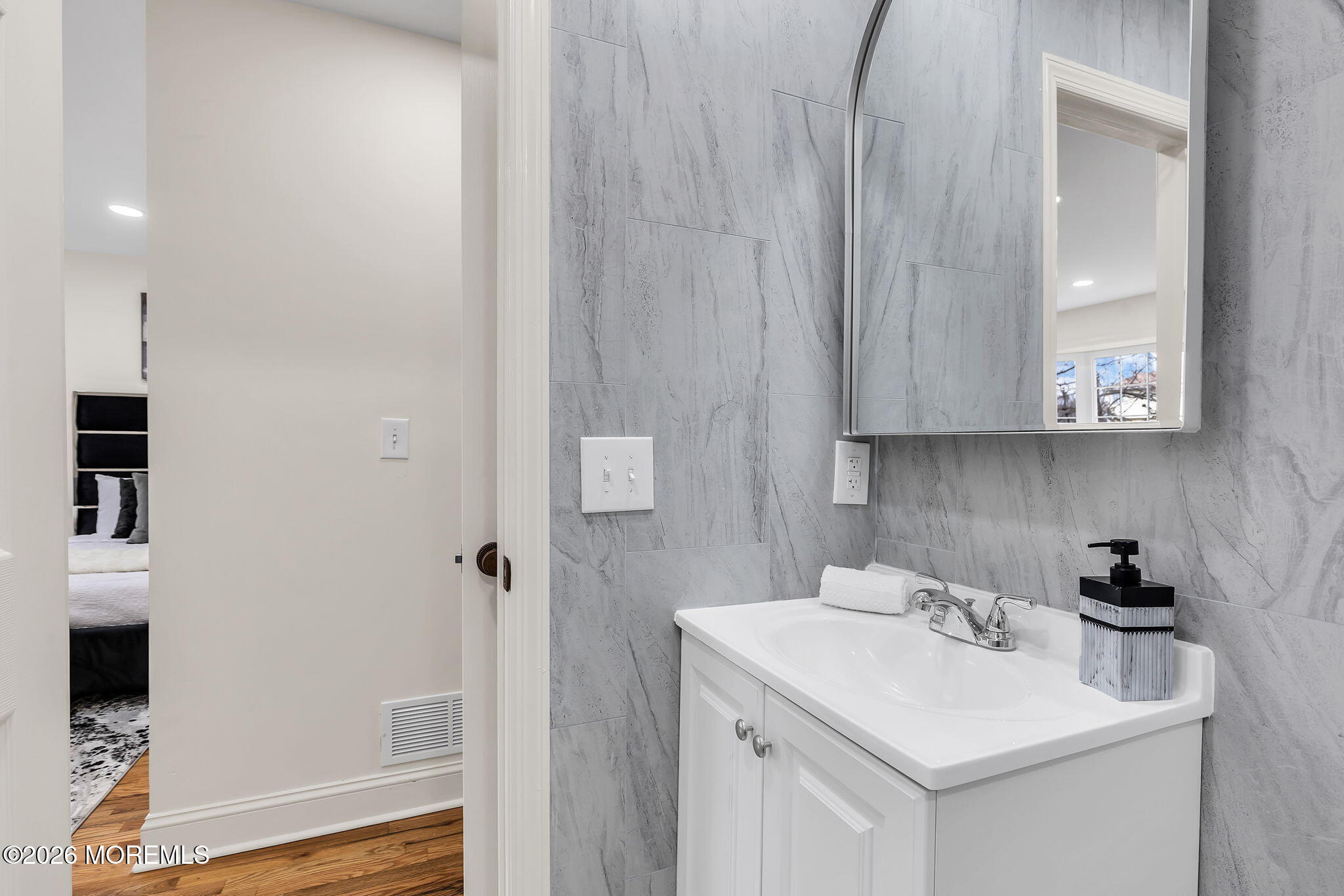 50 Westbrook Road Howell, NJ 07731 - Photo 39 of 73 a bathroom with a sink a toilet and shower
