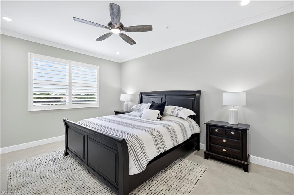 2319 Sawyers Hill Road, Unit 705 Naples, FL 34102 - Photo 13 of 29 Bedroom featuring crown molding, ceiling fan, recessed lighting, and light tile patterned floors