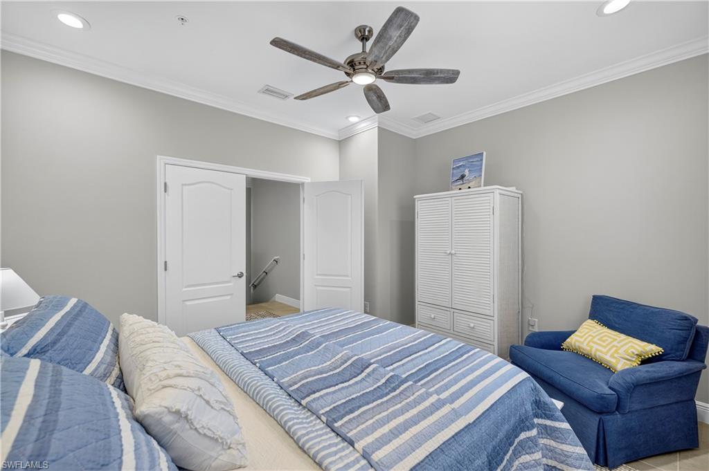 2319 Sawyers Hill Road, Unit 705 Naples, FL 34102 - Photo 21 of 29 Bedroom featuring ornamental molding, recessed lighting, and a ceiling fan