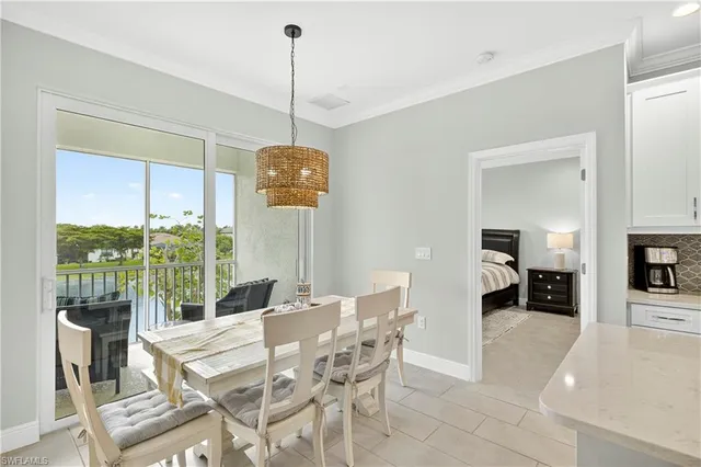a view of a dining room and furniture wooden floor a chandelier