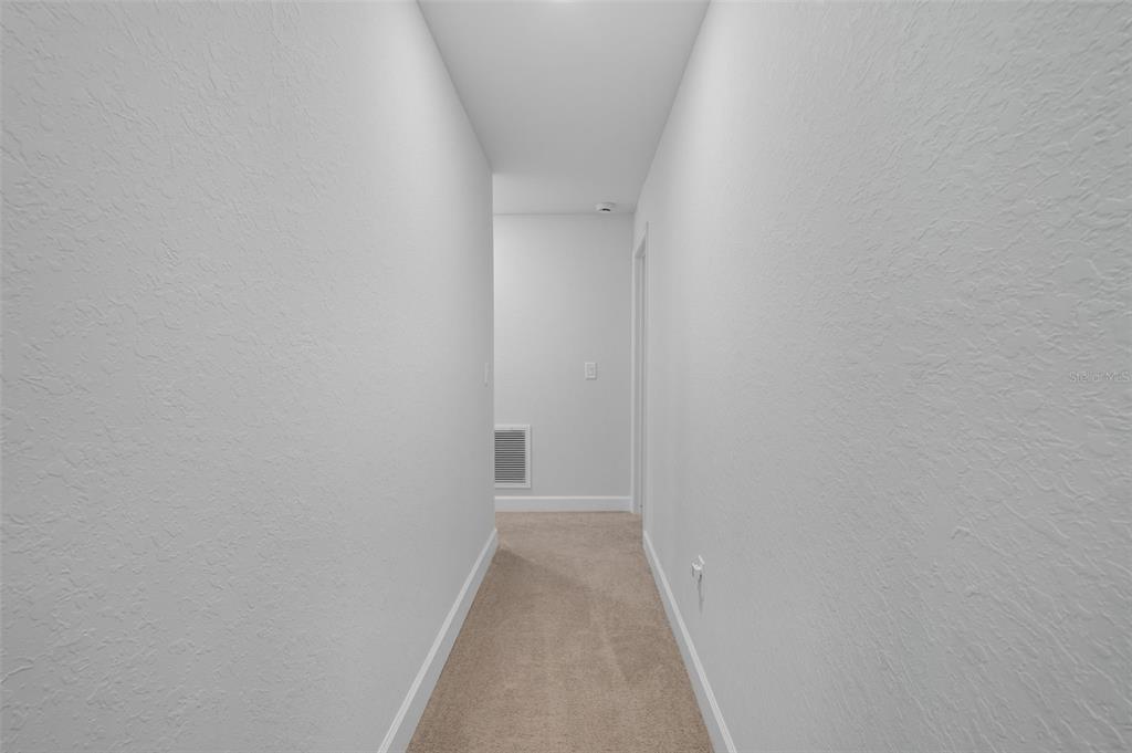 463 Trafalgar Lane Spring Hill, FL 34606 - Photo 30 of 36 a view of a hallway