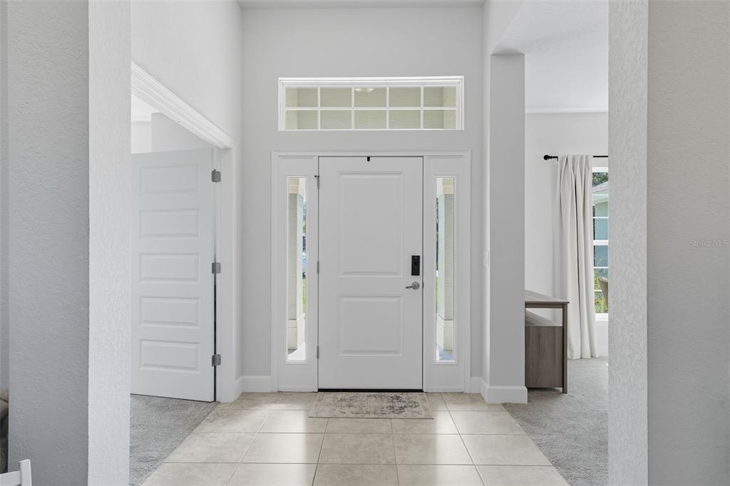 463 Trafalgar Lane Spring Hill, FL 34606 - Photo 4 of 36 an empty room with windows