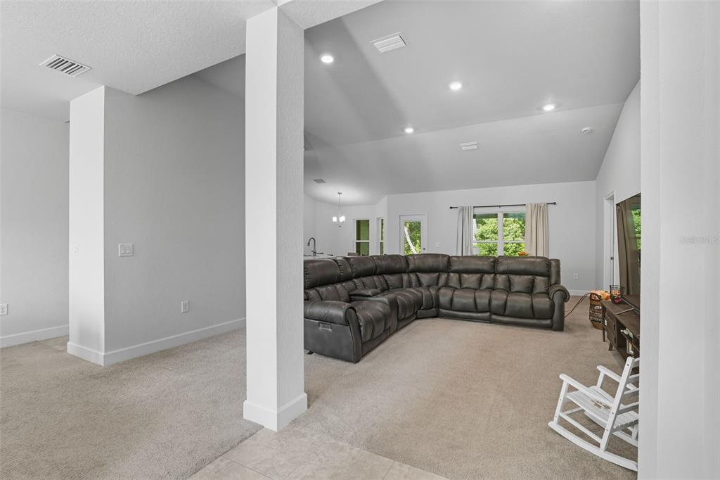 463 Trafalgar Lane Spring Hill, FL 34606 - Photo 5 of 36 a view of a livingroom with furniture and windows