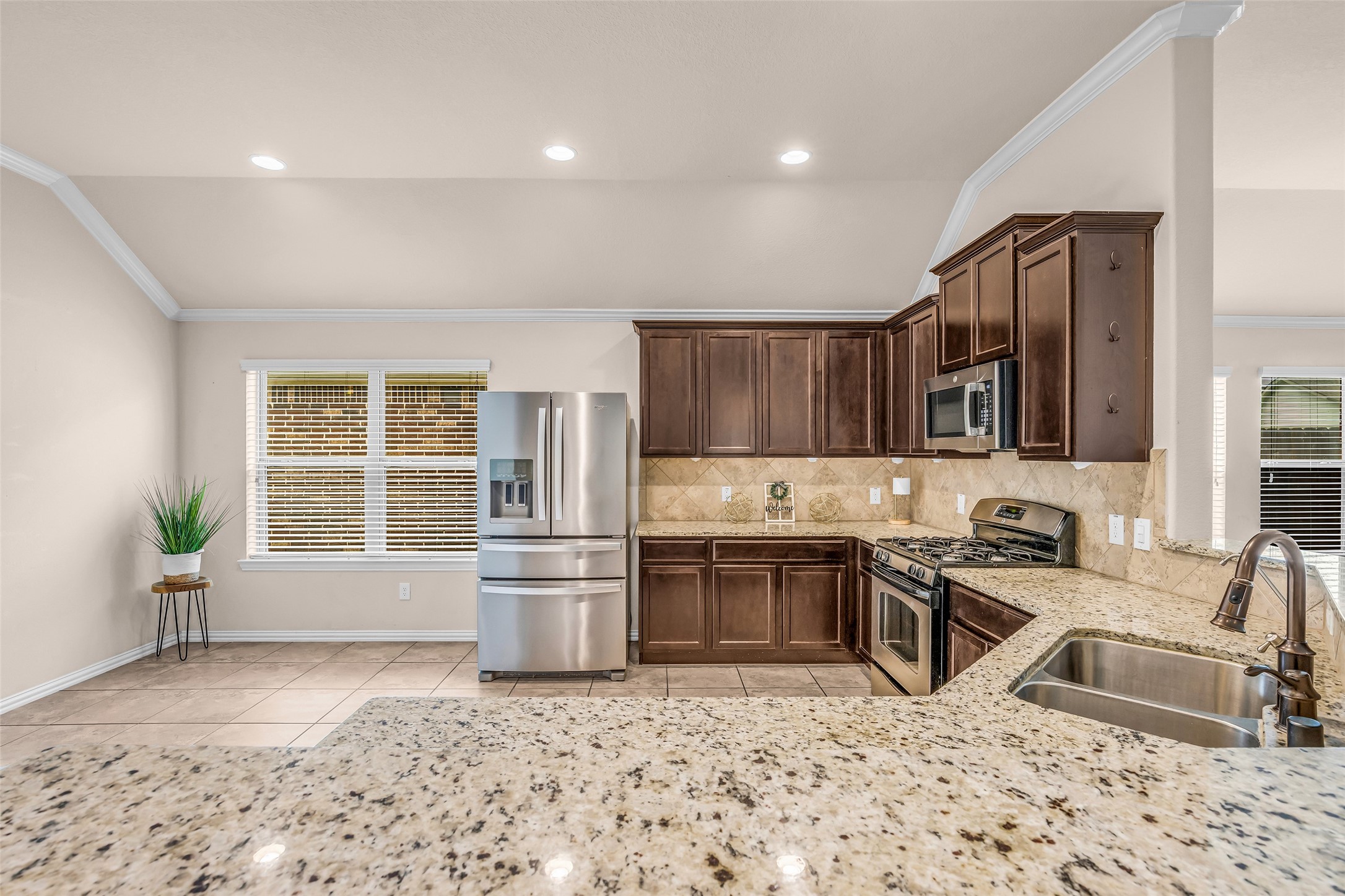 31747 Summit Springs Lane Spring, TX 77386 - Photo 10 of 29 Another view of the kitche with breakfast/eating area