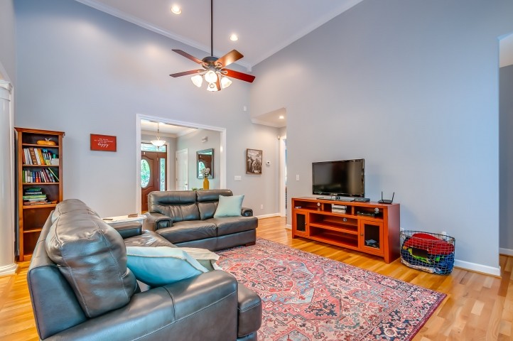 1169 Rip Steele Road Columbia, TN 38401 - Photo 19 of 42 a living room with furniture and a flat screen tv