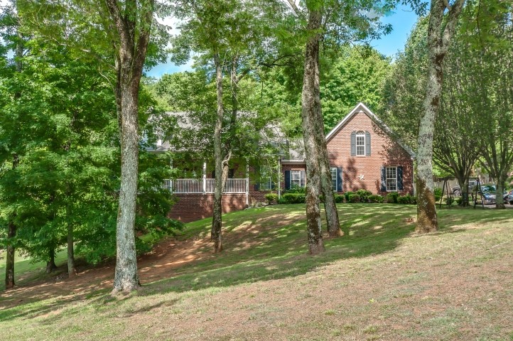 1169 Rip Steele Road Columbia, TN 38401 - Photo 3 of 42 a view of a house with a yard and large tree