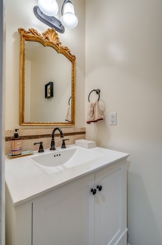 1169 Rip Steele Road Columbia, TN 38401 - Photo 31 of 42 a bathroom with a sink and a mirror