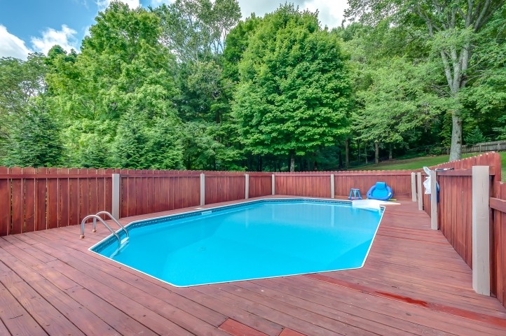 1169 Rip Steele Road Columbia, TN 38401 - Photo 39 of 42 a view of a swimming pool with a small yard