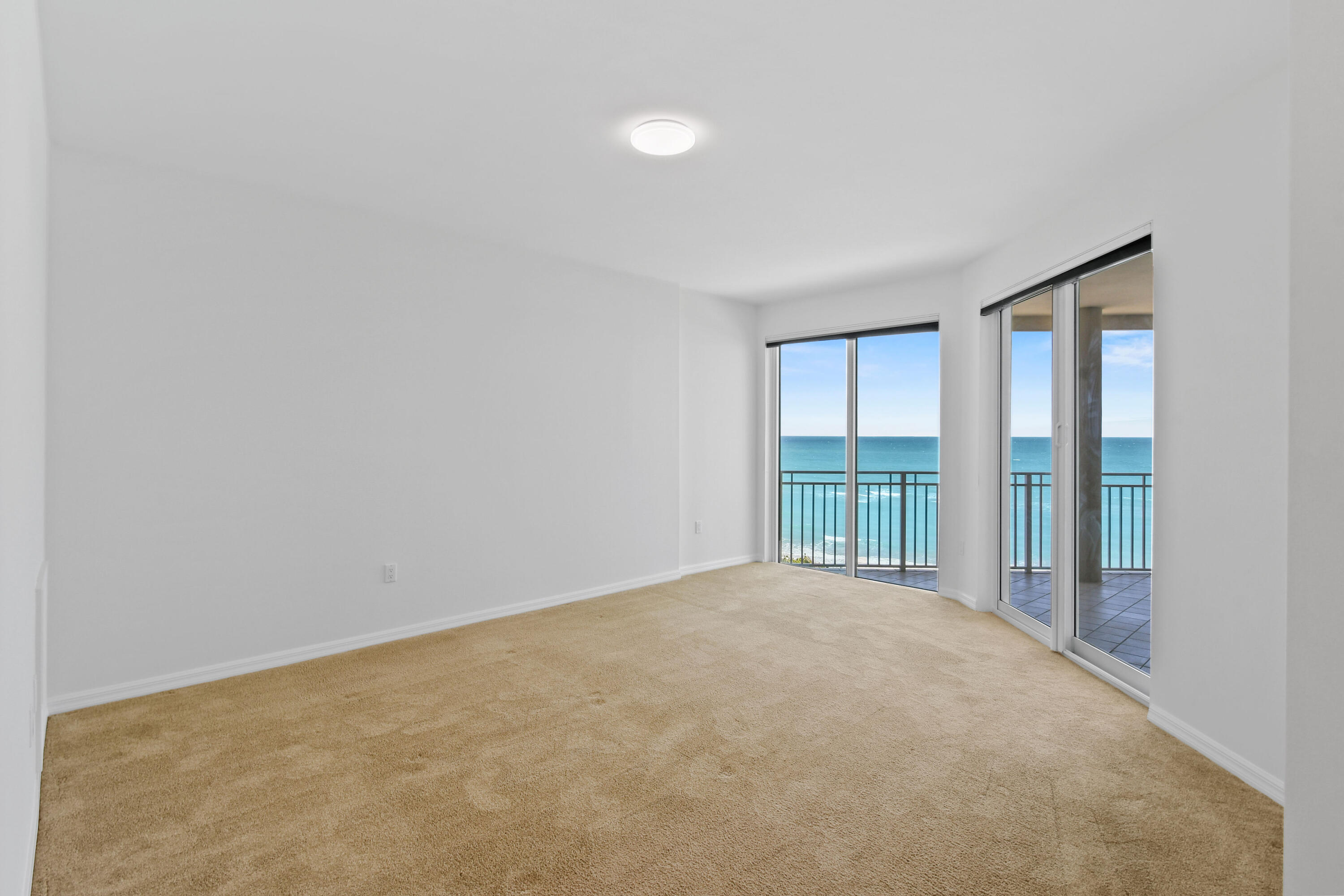1660 Florida A1A, Unit 352 Jupiter, FL 33477 - Photo 20 of 36 a view of an empty room with a window