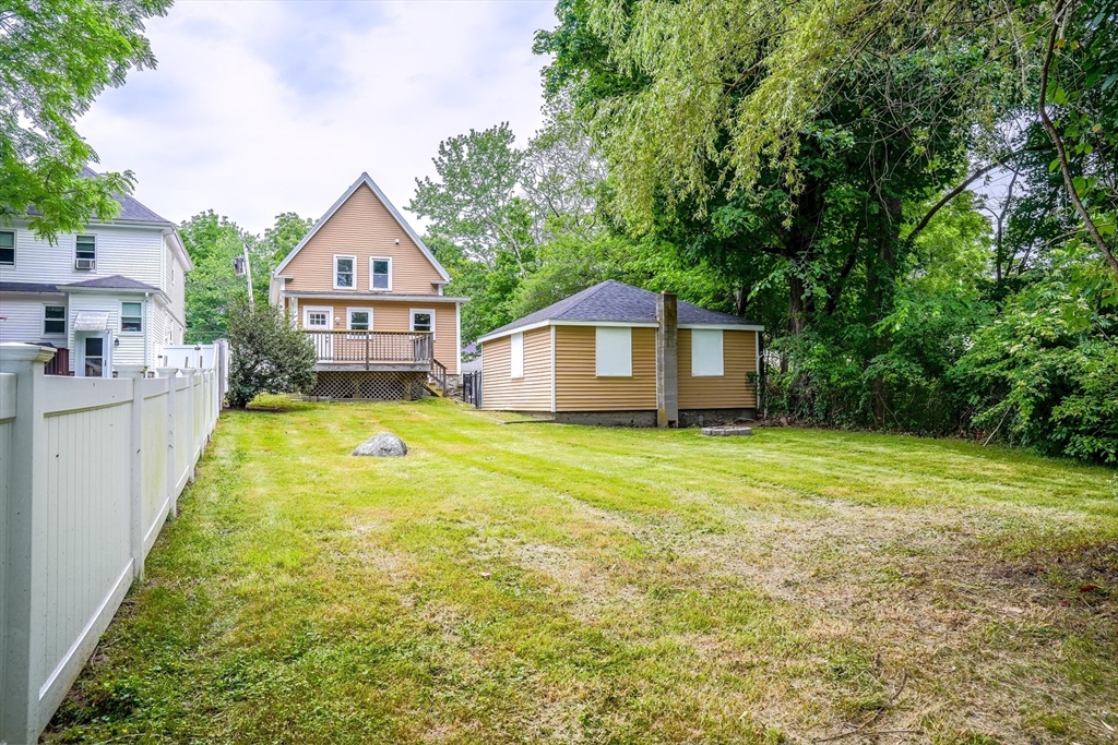 32 Dale Street Franklin, MA 02038 - Photo 11 of 11 a front view of a house with yard and green space