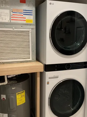 a living room with furniture and a lamp