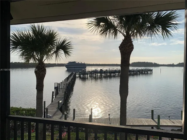 a sign on a pole on a street