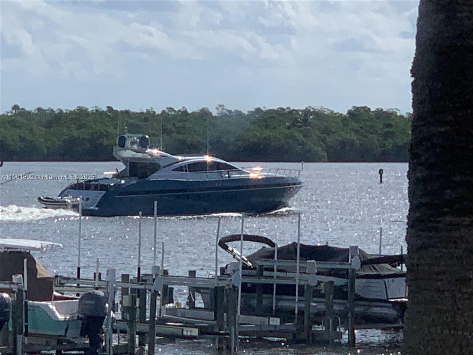 6102 Southeast Landing Way, Unit 2 Stuart, FL 34997 - Photo 51 of 51 a view of outdoor space yard and patio