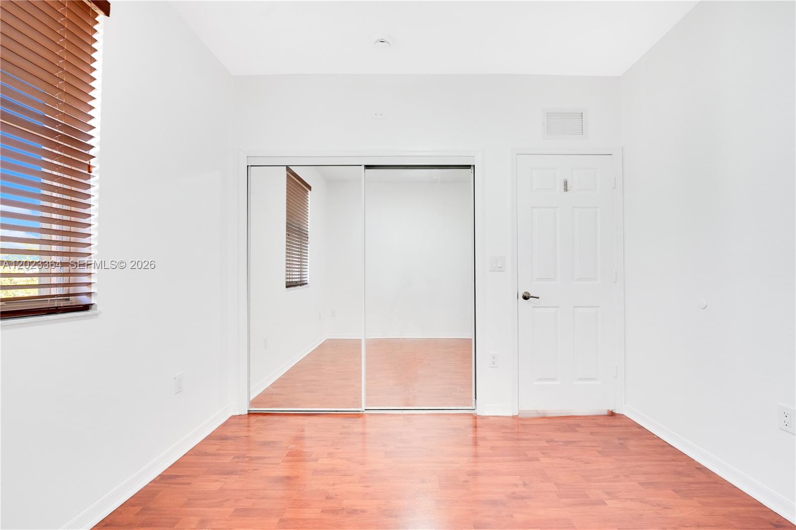 27433 Southwest 137th Court, Unit 1 Homestead, FL 33032 - Photo 15 of 28 a view of an empty room