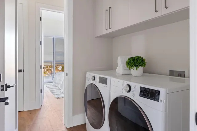 a view of livingroom with washer and dryer