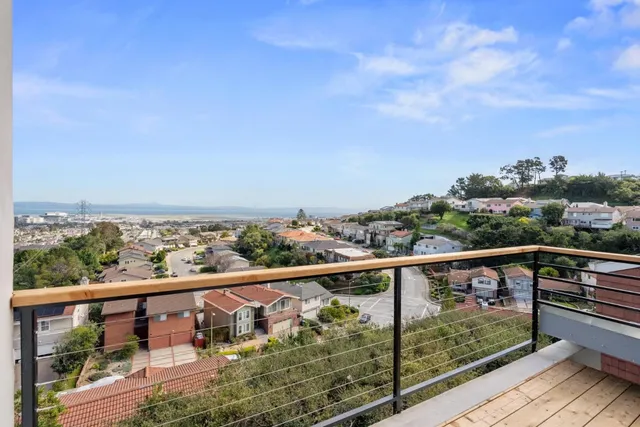 a view of city from a balcony