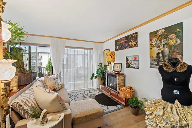 a living room with furniture and a window