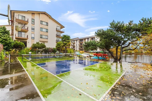 swimming pool view with a outdoor seating