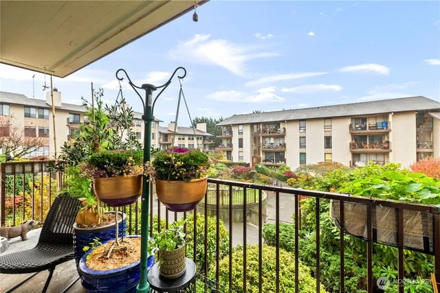 a view of a chair and table in balcony