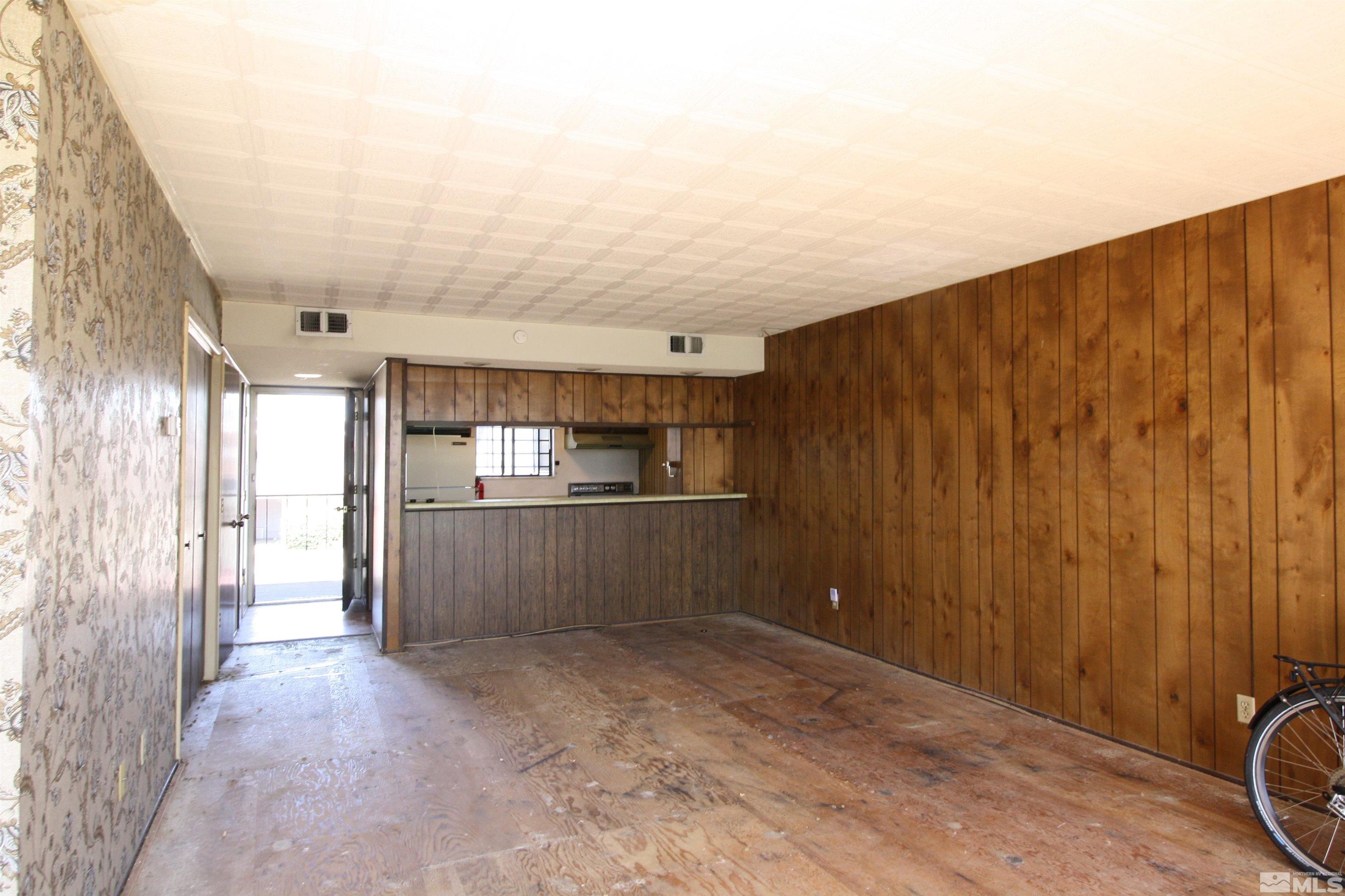 1540 Carlin Street, Unit BLD #1 Reno, NV 89503 - Photo 5 of 11 a view of a hallway with a bathroom