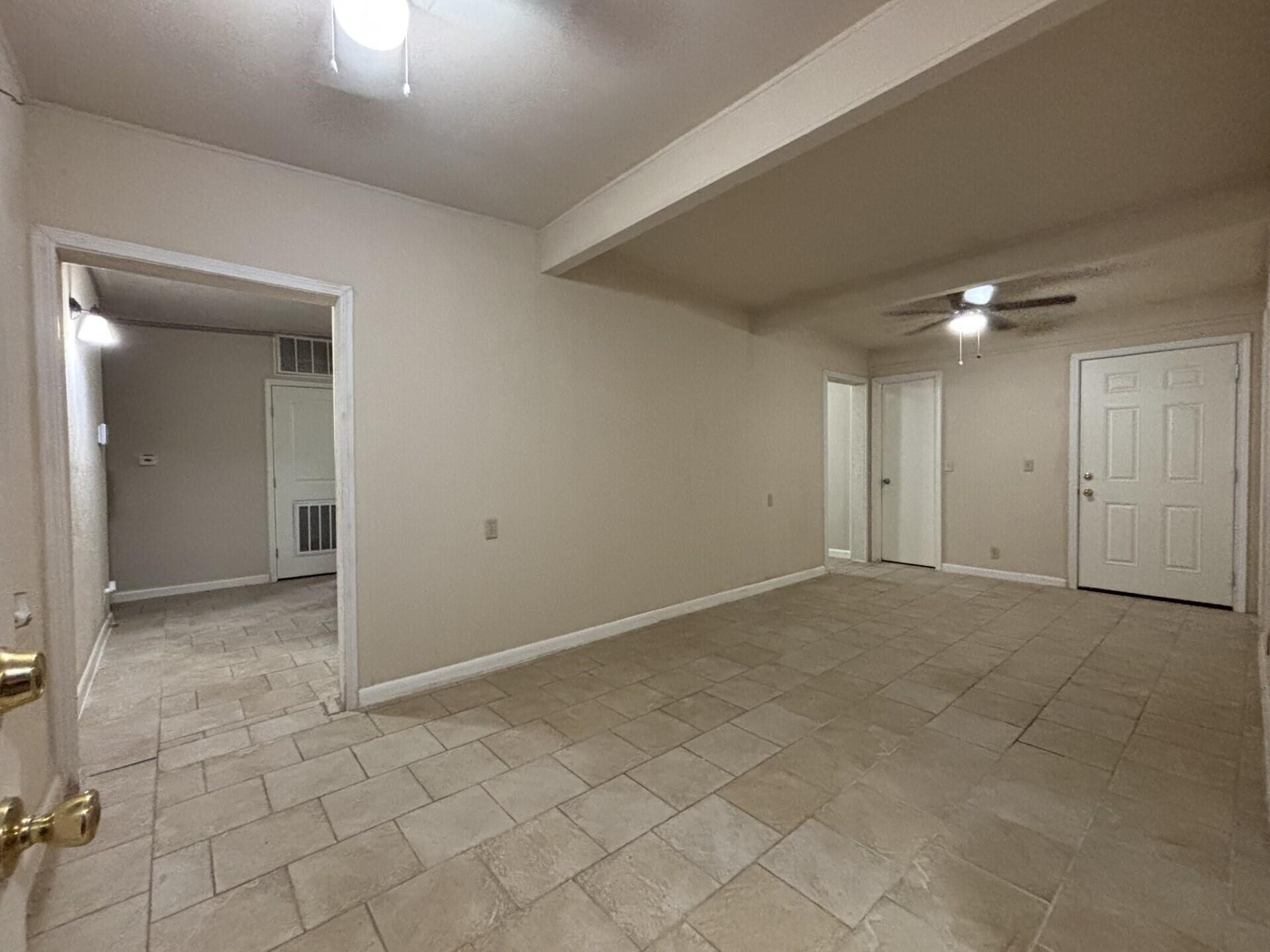 2313 47th Street Lubbock, TX 79412 - Photo 2 of 17 a view of an empty room