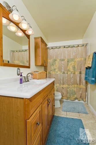 2973 Fitzgerald Road Simi Valley, CA 93065 - Photo 16 of 19 a bathroom with a sink a toilet and shower