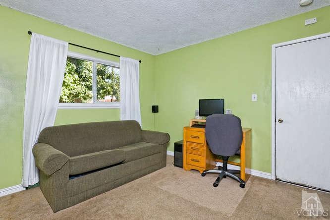 2973 Fitzgerald Road Simi Valley, CA 93065 - Photo 9 of 19 a living room with furniture and a window