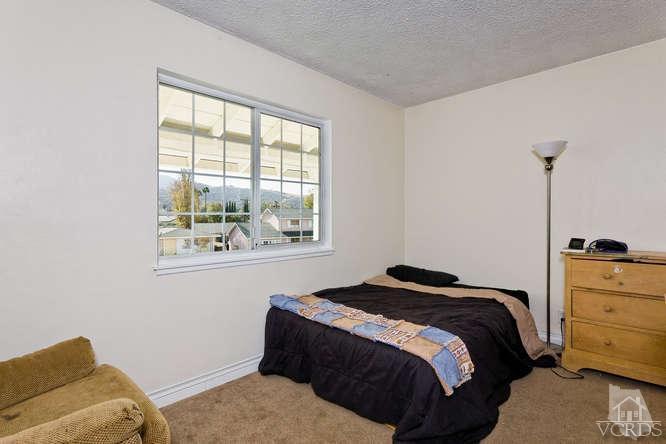 2973 Fitzgerald Road Simi Valley, CA 93065 - Photo 10 of 19 a bedroom with a bed and a window